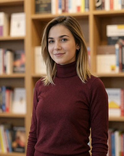 Ecaterina, 29-year-old Moldovan woman from Chișinău with dark blonde hair in a cozy bookstore